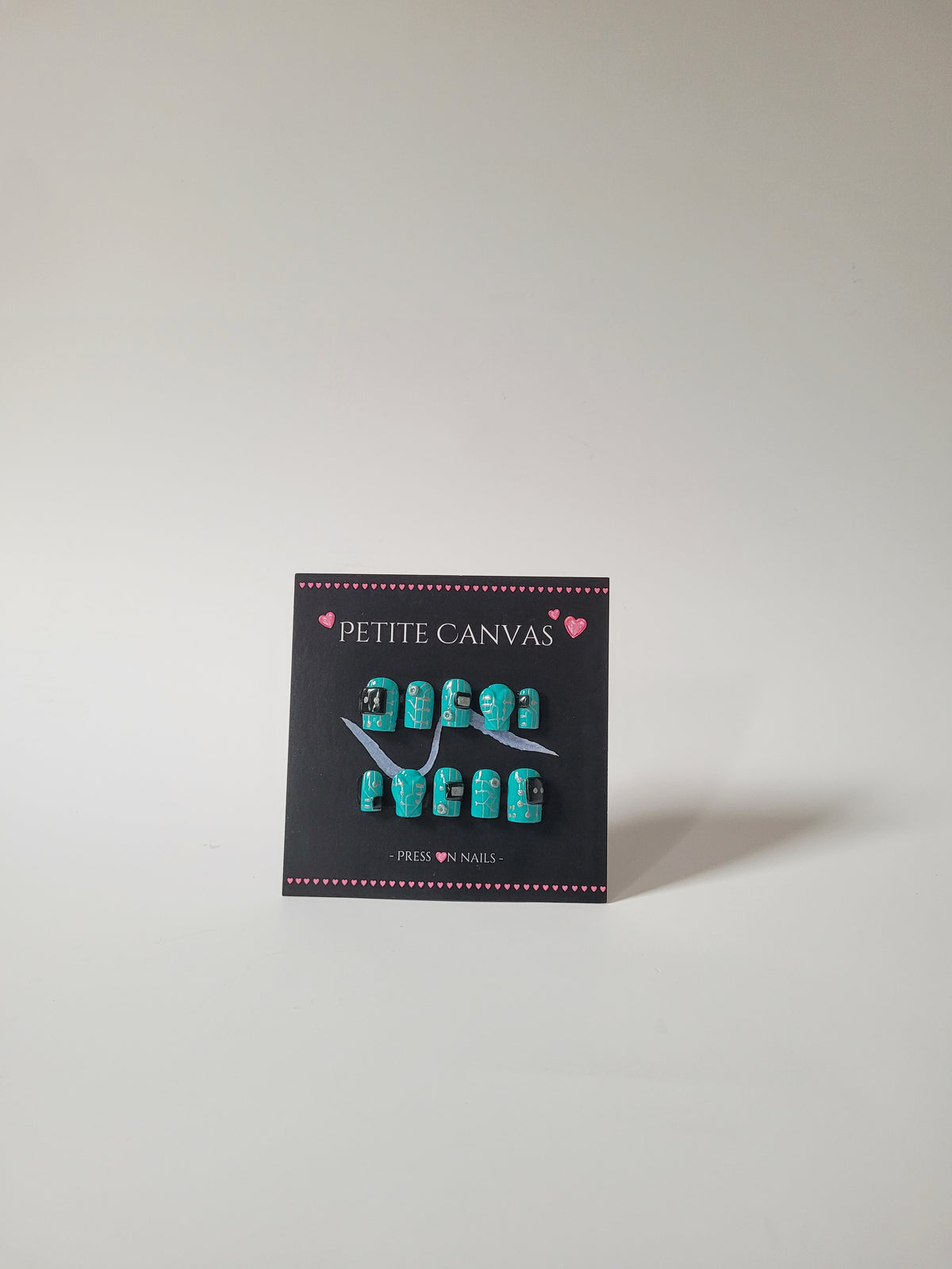 Bot 1026B full press-on nail set on display card — turquoise tech-inspired nail art, small square