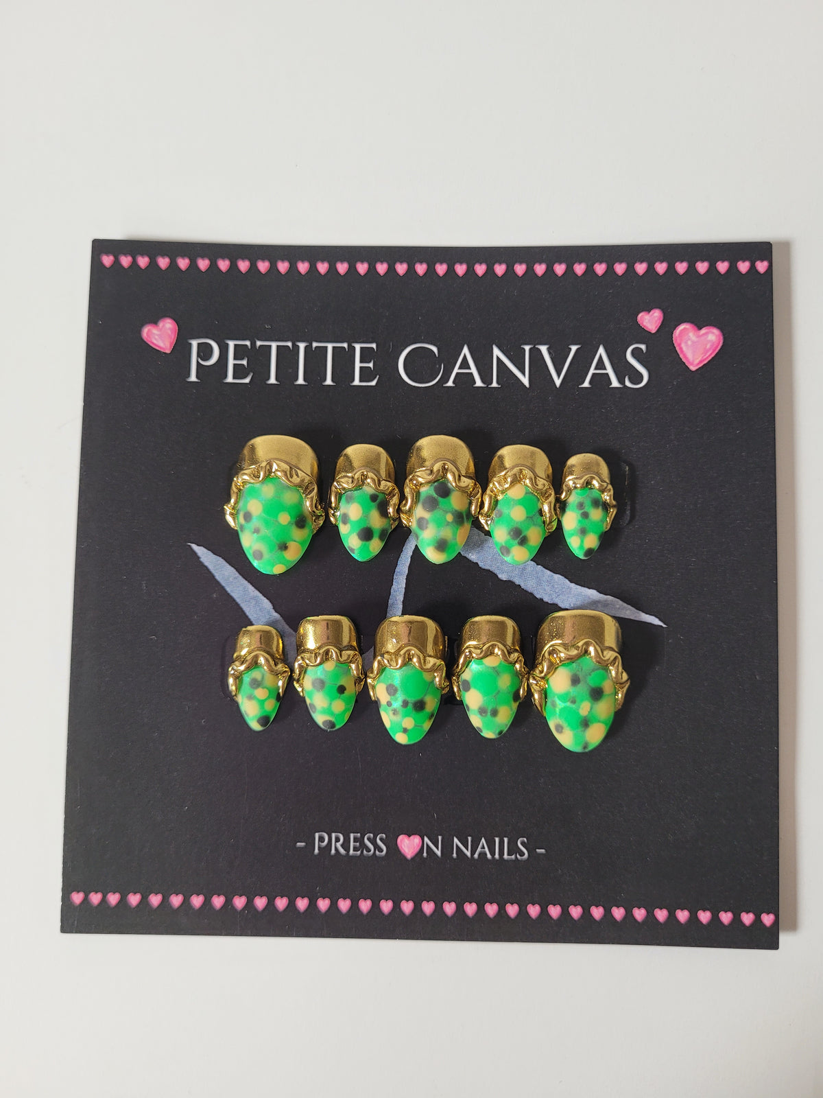 Gold and Scales press-on nails detail — extraterrestrial green texture with gold accents
