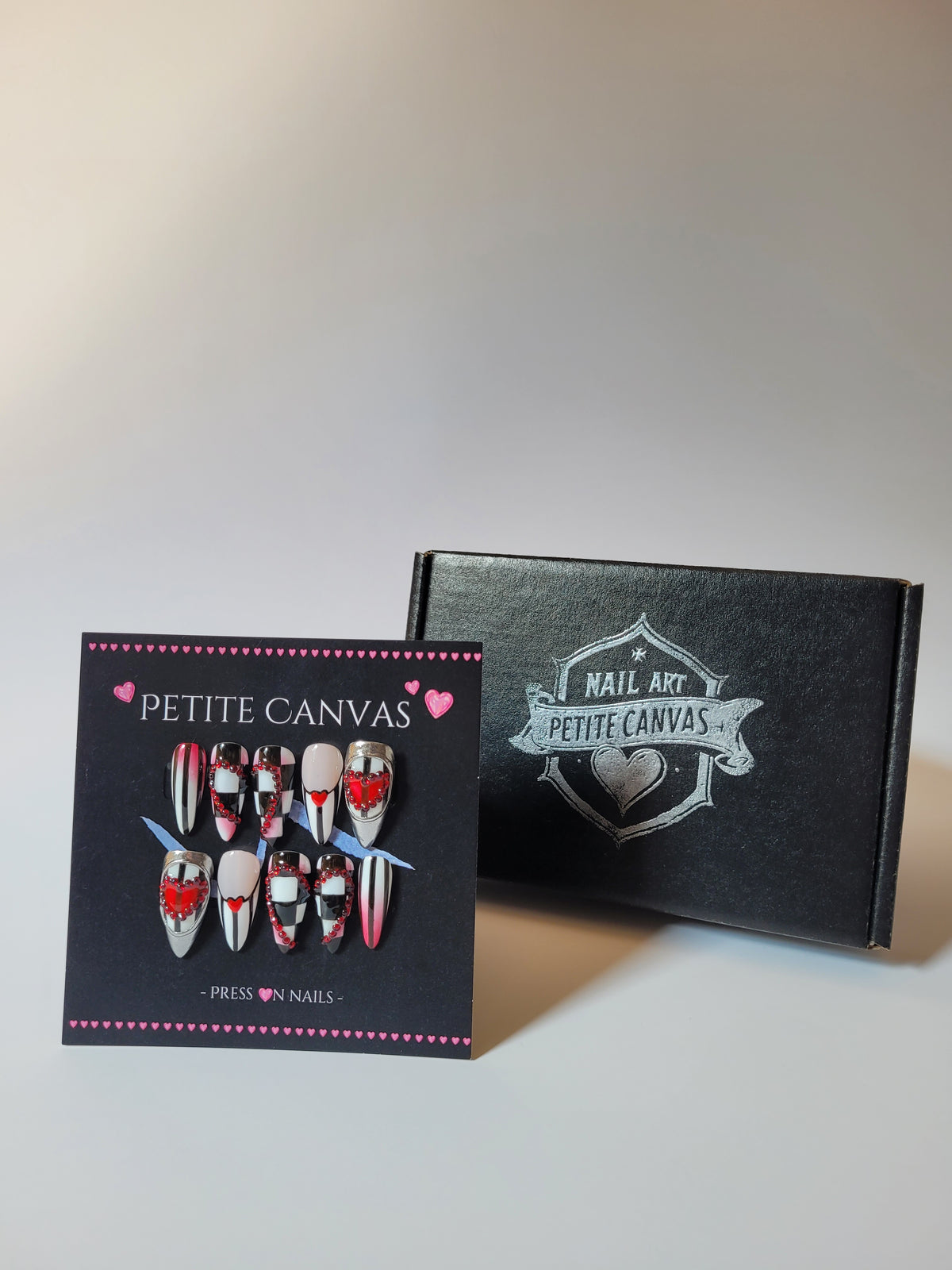 Off with their Heads press-on nail set — red, black and white Queen of Hearts design on medium stilettos, with gift box and application kit