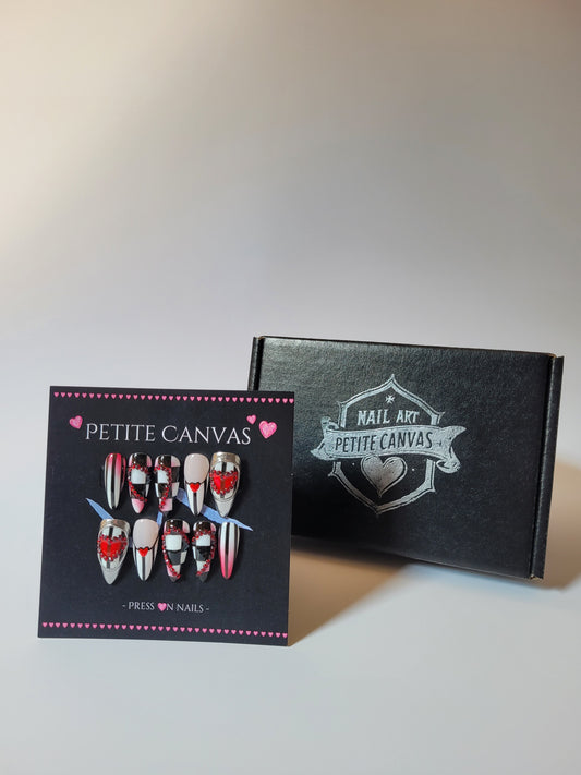 Off with their Heads press-on nail set — red, black and white Queen of Hearts design on medium stilettos, with gift box and application kit