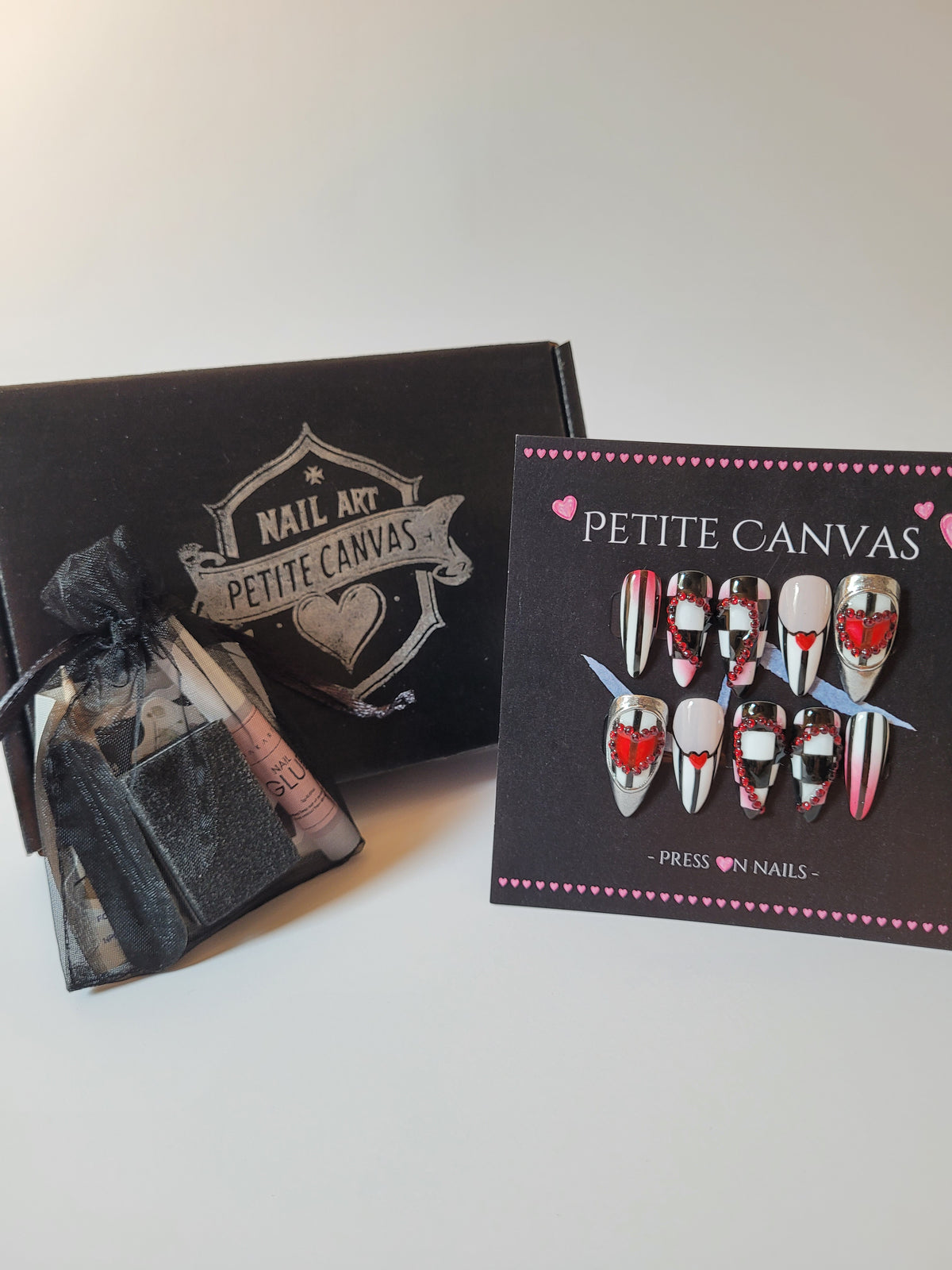 Off with their Heads full press-on nail set — red, black and white geometric Queen of Hearts nail art, medium stiletto