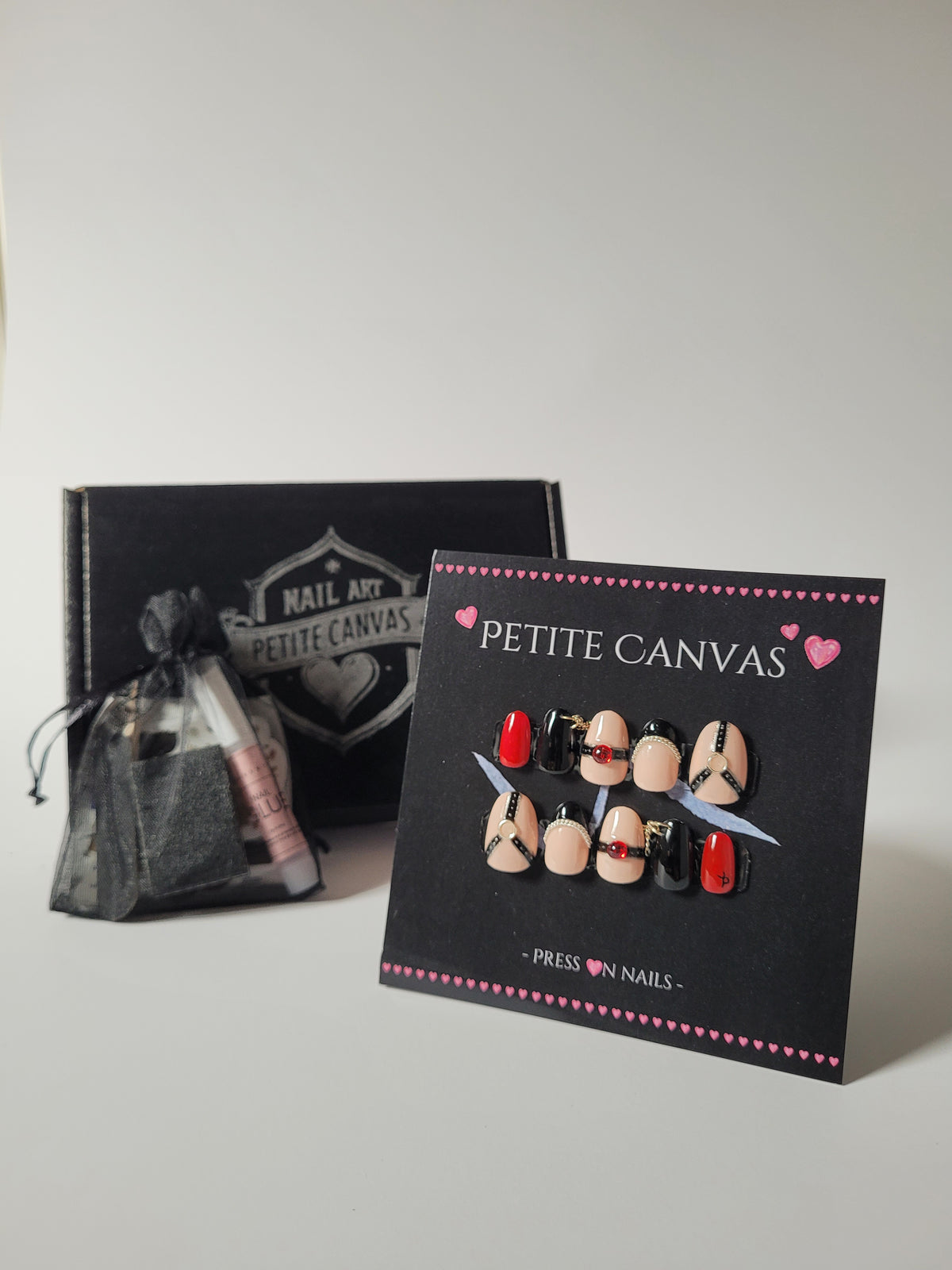 Whip-Me press-on set on display card with Petite Canvas gift box and application kit